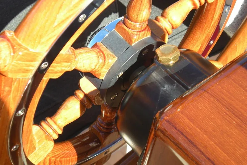 Slide: The Image of Wooden steering wheel of a 2001 Wajer Captain's Launch 7m boat. - 8