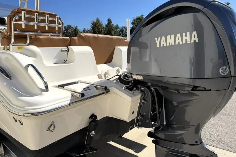 Slide: The Image of 2025 Key West 239 FS boat with Yamaha outboard motor, rear view. - 11