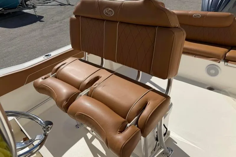Slide: The Image of 2025 Key West 239 FS boat with luxurious tan leather seating. - 27