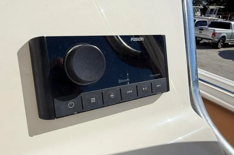Slide: The Image of Fusion audio system on 2025 Key West 239 FS boat dashboard. - 32