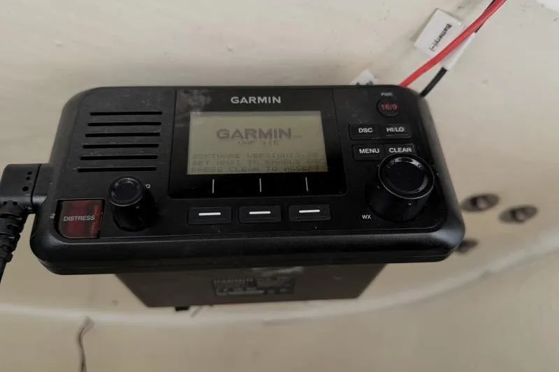 Slide: The Image of Garmin marine radio on 2025 Key West 239 FS boat dashboard. - 34