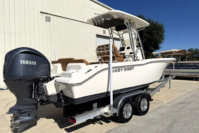 Slide: The Image of 2025 Key West 239 FS boat on trailer with Yamaha outboard motor. - 5
