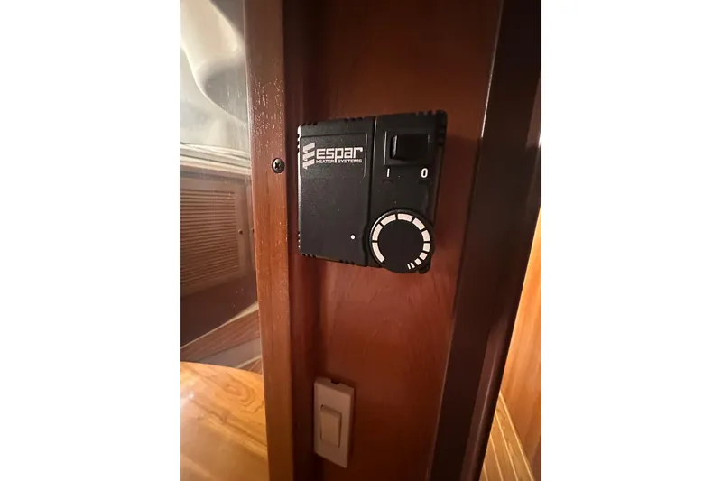 Slide: The Image of Espar heater control panel in 2003 Catalina 470 yacht interior. - 15