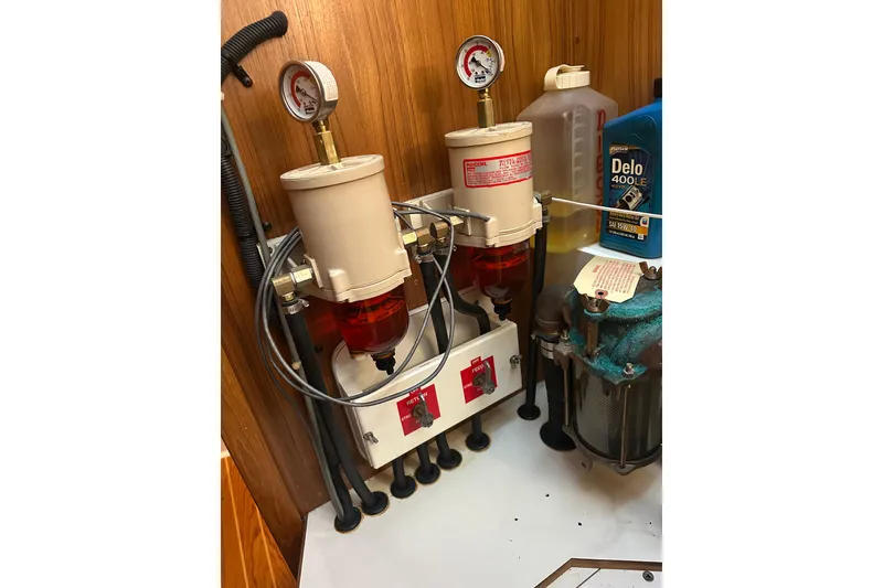 Slide: The Image of Engine room of 2003 Catalina 470 with fuel filters and gauges. - 18