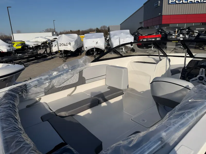 Slide: The Image of 2026 Bayliner VR4 Bowrider OB displayed outdoors. - 6