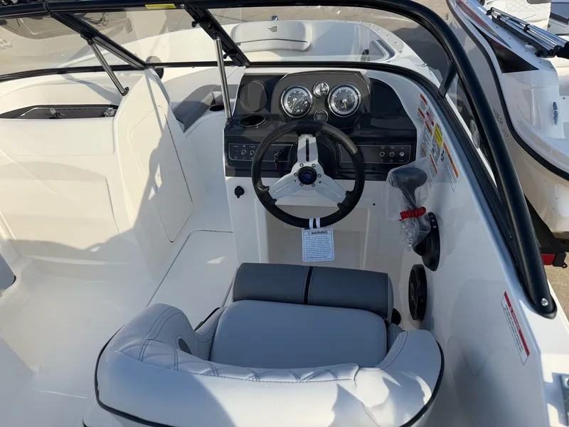 Slide: The Image of Interior view of 2026 Bayliner VR4 Bowrider OB cockpit. - 8