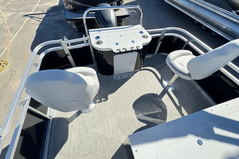 Slide: The Image of 2025 Avalon 2385 Rear Fish boat interior with seating and fishing station. - 12