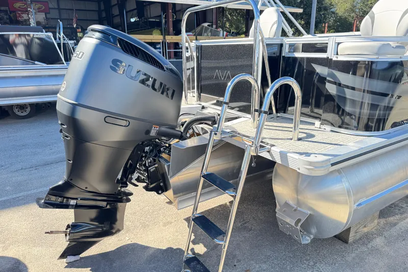Slide: The Image of 2025 Avalon 2385 Rear Fish pontoon boat with Suzuki outboard motor and ladder. - 4