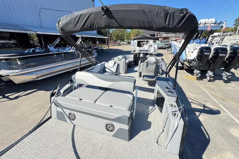 Slide: The Image of 2025 Avalon LSZ 2585 CRB pontoon boat with spacious seating and modern design. - 11