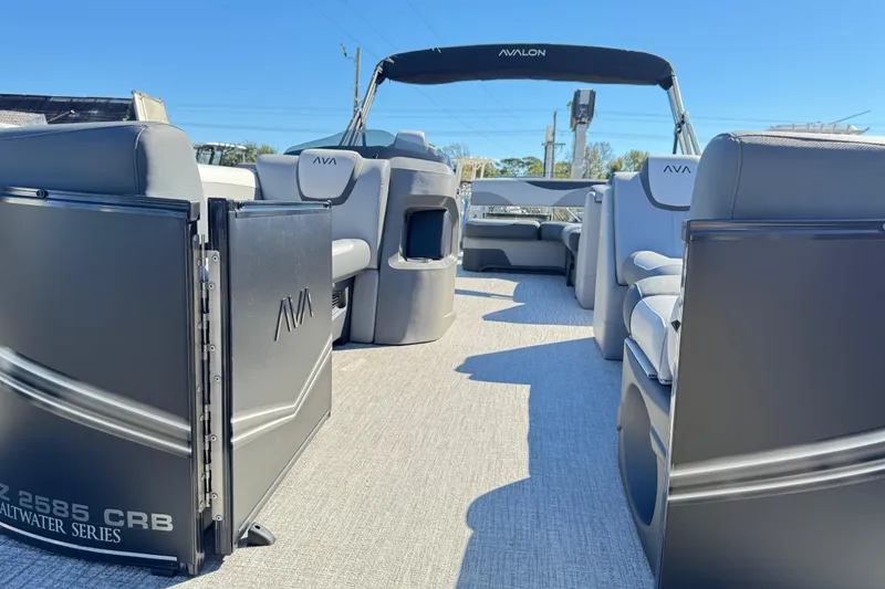 Slide: The Image of 2025 Avalon LSZ 2585 CRB pontoon boat interior with luxurious seating. - 2