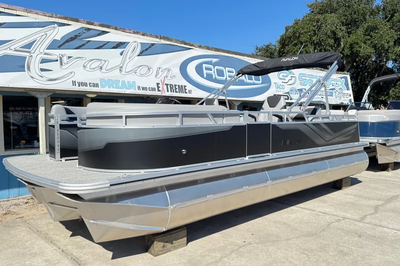 The Image of 2025 Avalon Venture 2385 VRB pontoon boat displayed at dealership. - 1