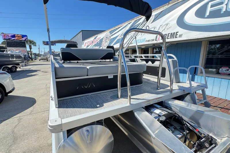 Slide: The Image of 2025 Avalon Venture 2385 VRB pontoon boat with sleek seating and modern design. - 7