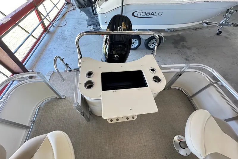 Slide: The Image of 2025 Avalon 2185 Rear Fish boat interior with fishing station and seating. - 9