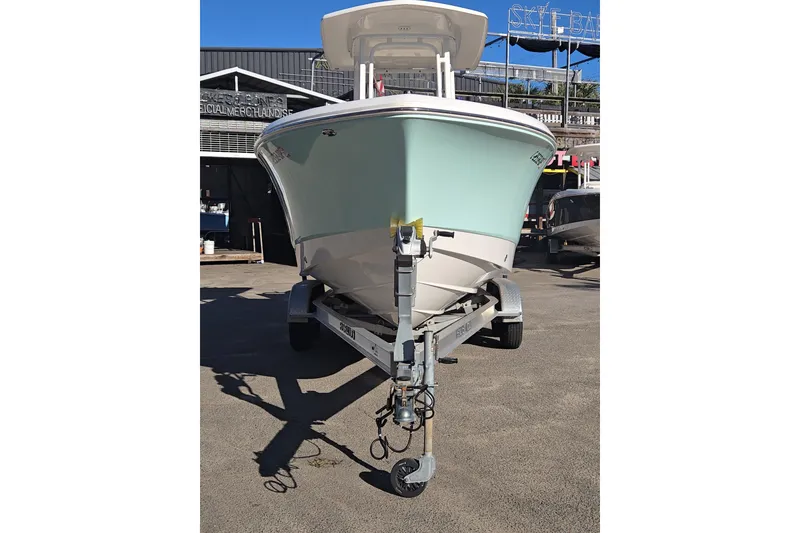 The Image of 2021 Robalo R230 Center Console boat on trailer, front view. - 1