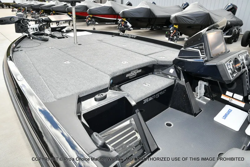 Slide: The Image of 2023 Ranger Z520R boat interior with advanced navigation system and spacious deck. - 18