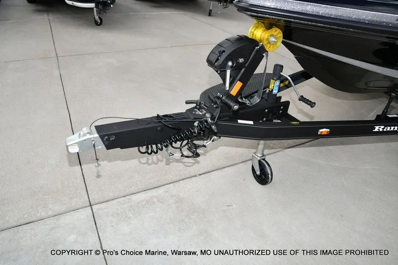 Slide: The Image of 2023 Ranger Z520R boat trailer hitch and winch on concrete surface. - 36
