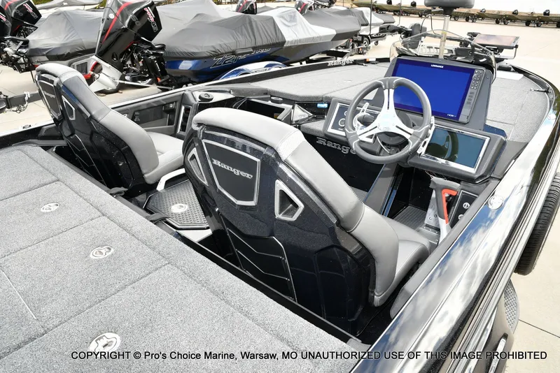 Slide: The Image of 2023 Ranger Z520R boat interior with advanced navigation system and sleek seating design. - 41
