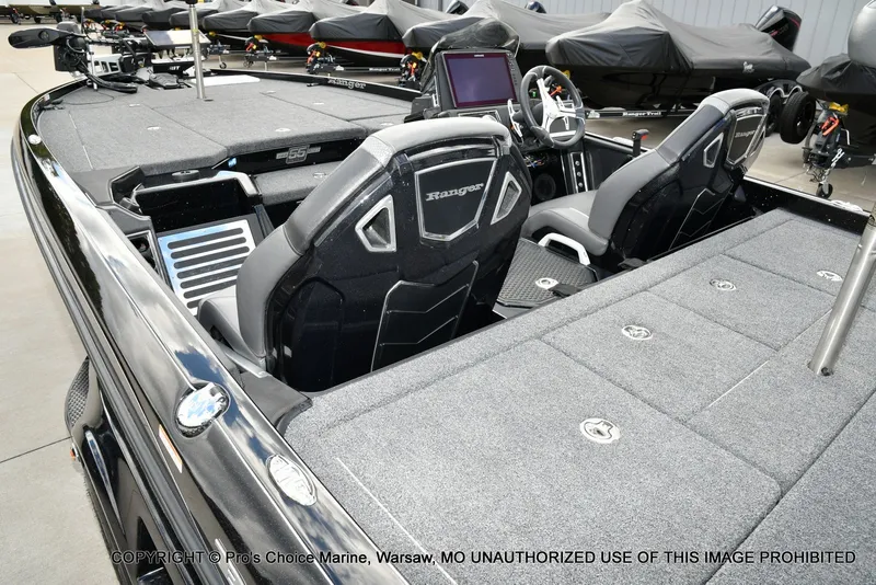 Slide: The Image of 2023 Ranger Z520R boat interior with advanced dashboard and seating, showcasing modern design and functionality. - 45