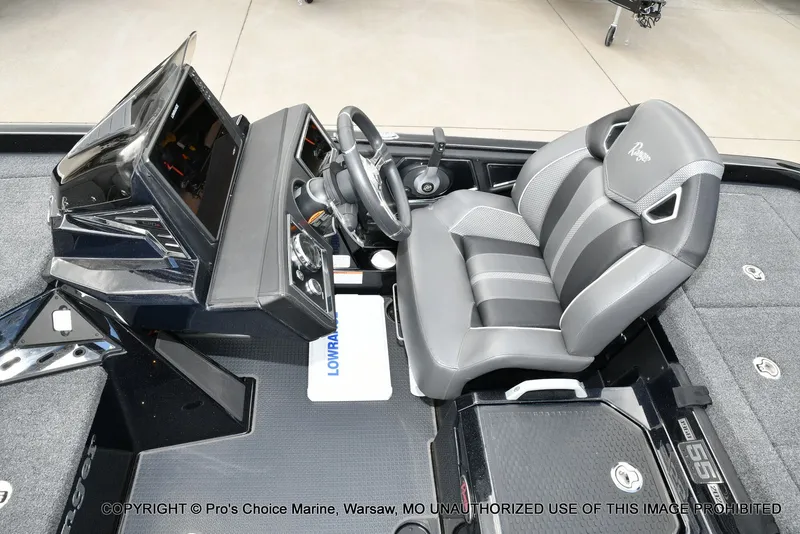 Slide: The Image of 2023 Ranger Z520R boat cockpit with sleek design and modern controls. - 49