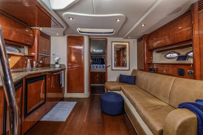 Slide: The Image of Luxurious interior of 2005 Sea Ray 390 Sundancer yacht with elegant wood finishes. - 17