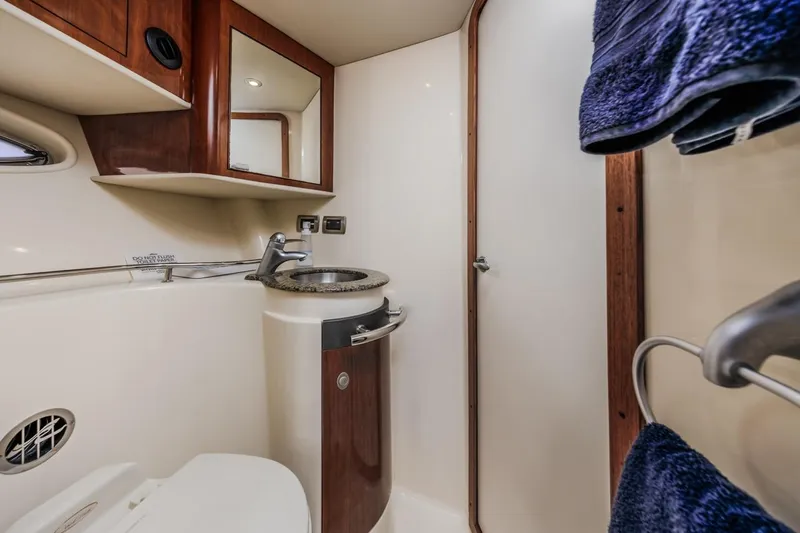 Slide: The Image of Luxurious bathroom in 2005 Sea Ray 390 Sundancer yacht with modern fixtures. - 28