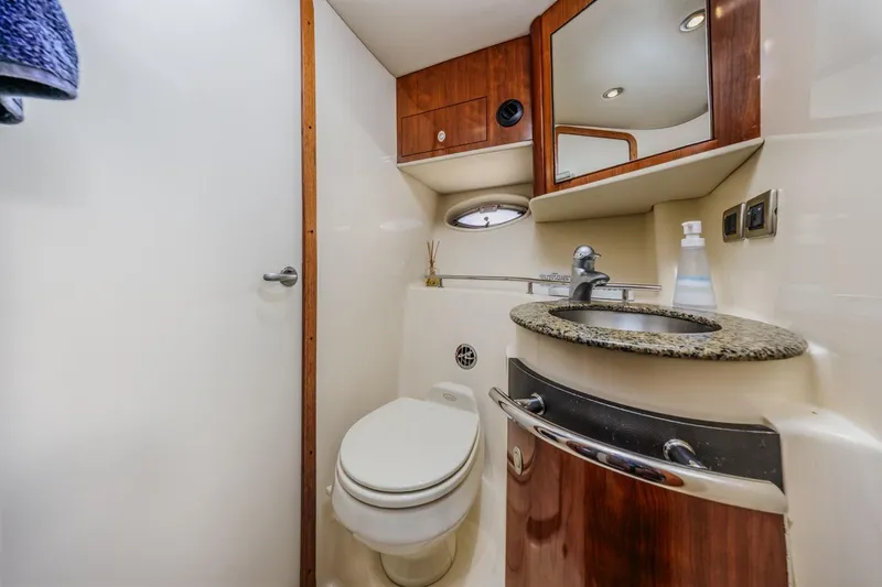 Slide: The Image of Luxurious bathroom in 2005 Sea Ray 390 Sundancer yacht with modern fixtures. - 29