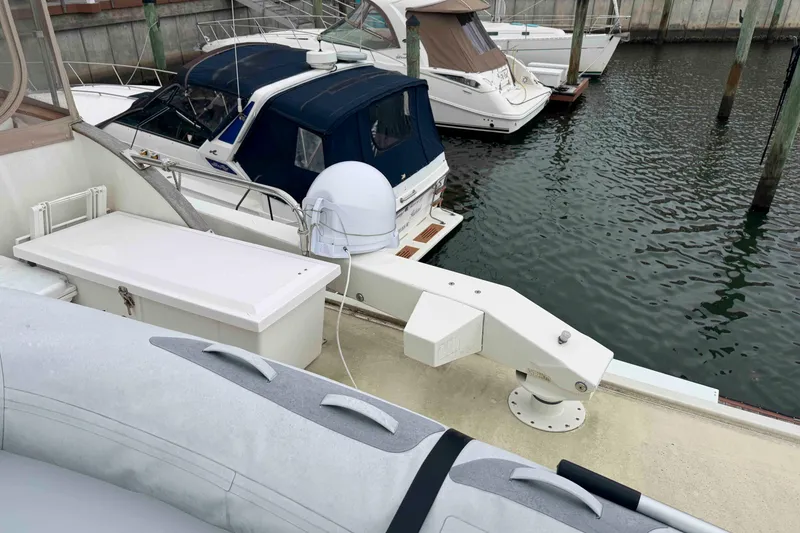 Slide: The Image of Helm of 1998 Krogen Express 49 with navigation instruments and steering wheel. - 19
