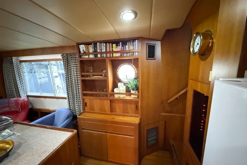 Slide: The Image of Wooden interior of 1998 Krogen Express 49 yacht with louvered doors and fire extinguisher. - 47