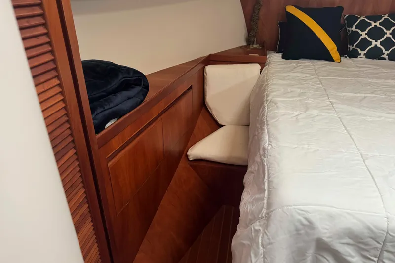 Slide: The Image of Shower area in 1998 Krogen Express 49 yacht with white curtain and flexible hose. - 52