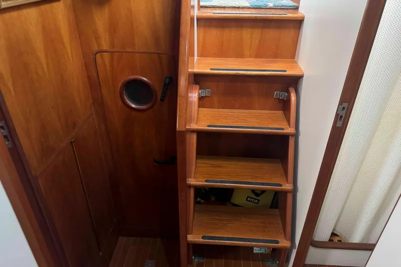 Slide: The Image of Bathroom interior of 1998 Krogen Express 49 yacht, featuring sink and toilet. - 57