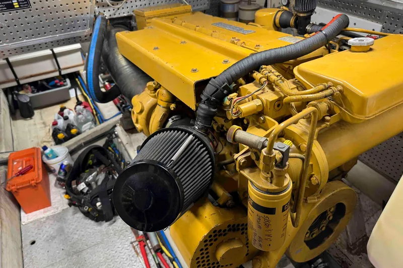 Slide: The Image of Engine compartment of 1998 Krogen Express 49, showing shaft and mechanical components. - 85