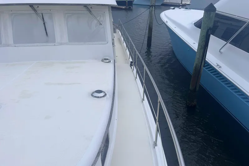 Slide: The Image of Docked 1998 Krogen Express 49 yacht beside another boat. - 13