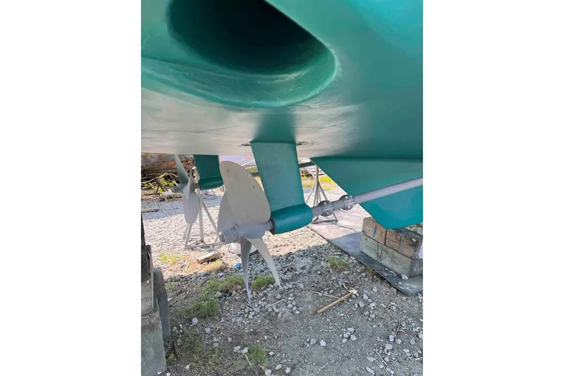 Slide: The Image of Steering wheel of 1998 Krogen Express 49 yacht with control panel. - 22