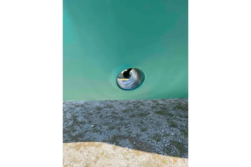 Slide: The Image of Control panel of a 1998 Krogen Express 49 boat with gauges and navigation system. - 24