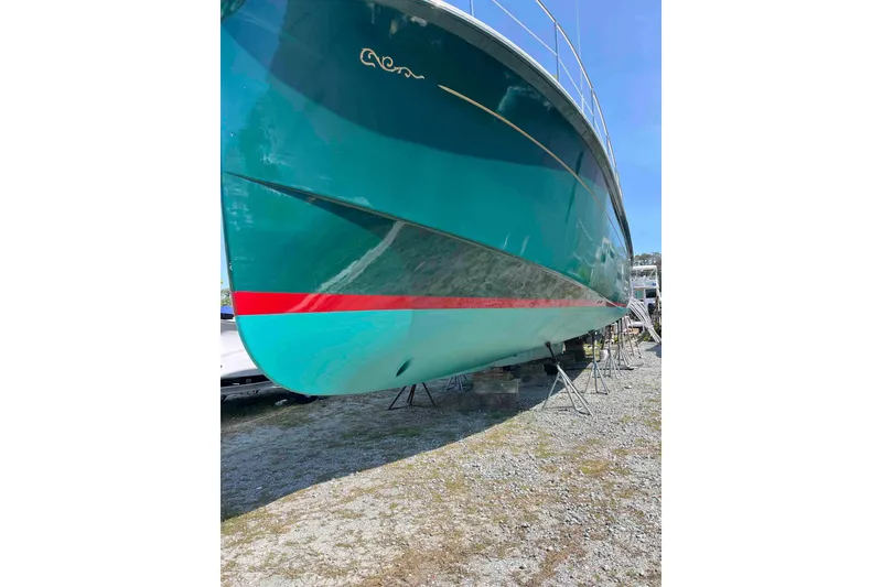 Slide: The Image of Interior of 1998 Krogen Express 49 yacht with wooden helm and navigation instruments. - 25