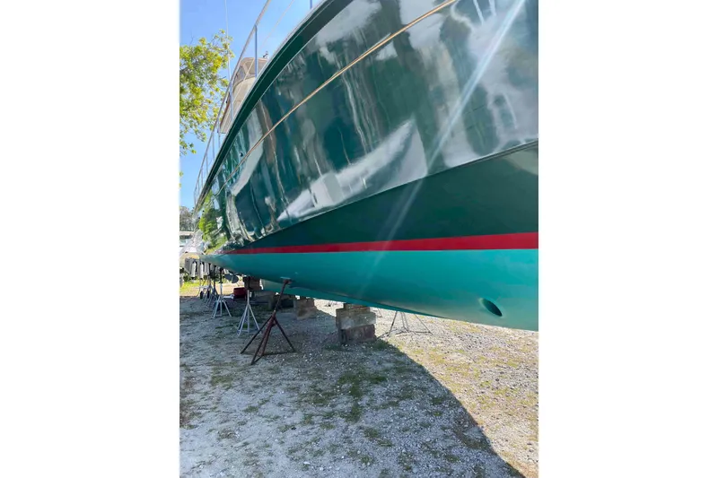 Slide: The Image of Interior of 1998 Krogen Express 49 yacht with wooden finish and staircase. - 26