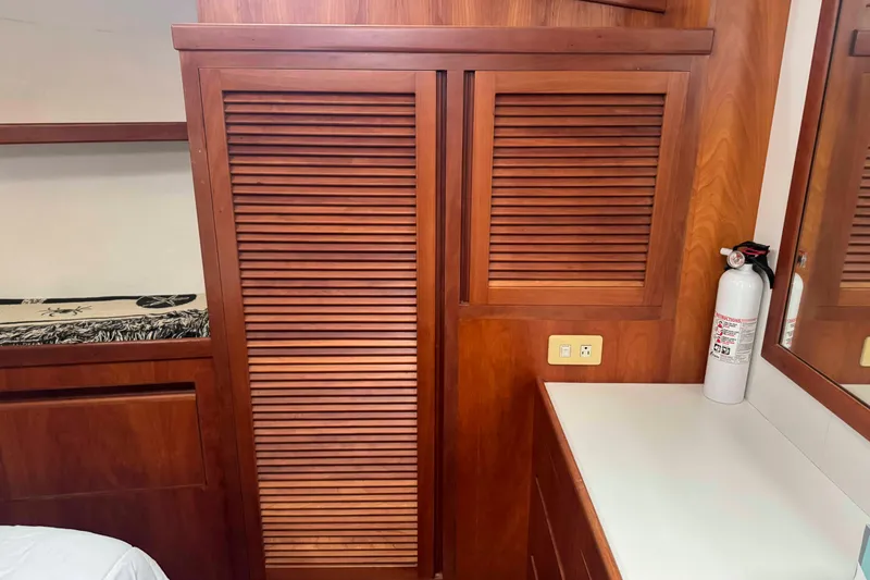 Slide: The Image of Cozy seating area on 1998 Krogen Express 49 yacht with patterned cushions. - 49