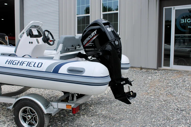 Slide: The Image of 2023 Highfield CL420 boat with Mercury 50 outboard motor on a trailer. - 3