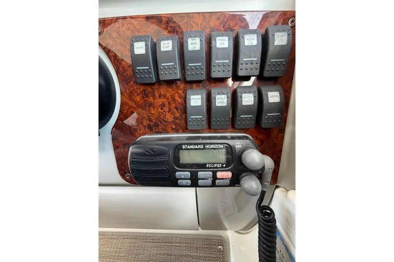 Slide: The Image of Control panel and radio on a 2005 Formula 37 Performance Cruiser boat. - 20