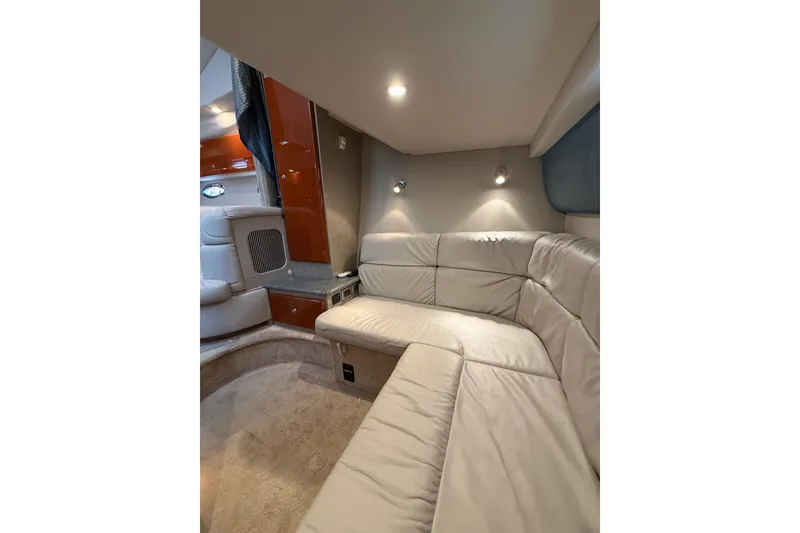 Slide: The Image of Luxurious interior of 2005 Formula 37 Performance Cruiser with plush seating and ambient lighting. - 35