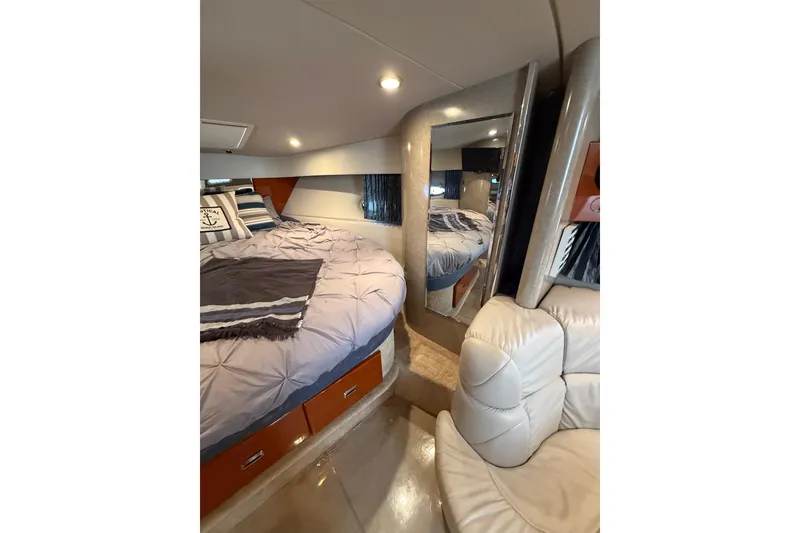 Slide: The Image of 2005 Formula 37 Performance Cruiser interior with cozy bed and elegant seating. - 38