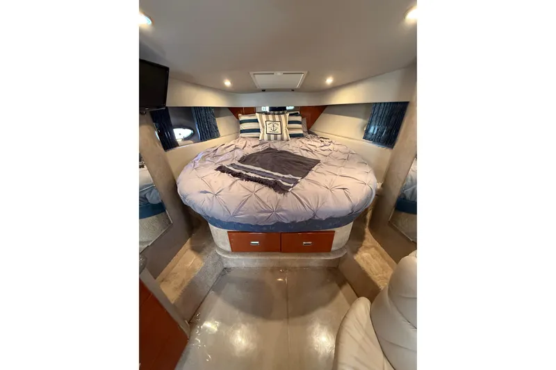 Slide: The Image of Luxurious interior of 2005 Formula 37 Performance Cruiser with cozy bed and elegant decor. - 39