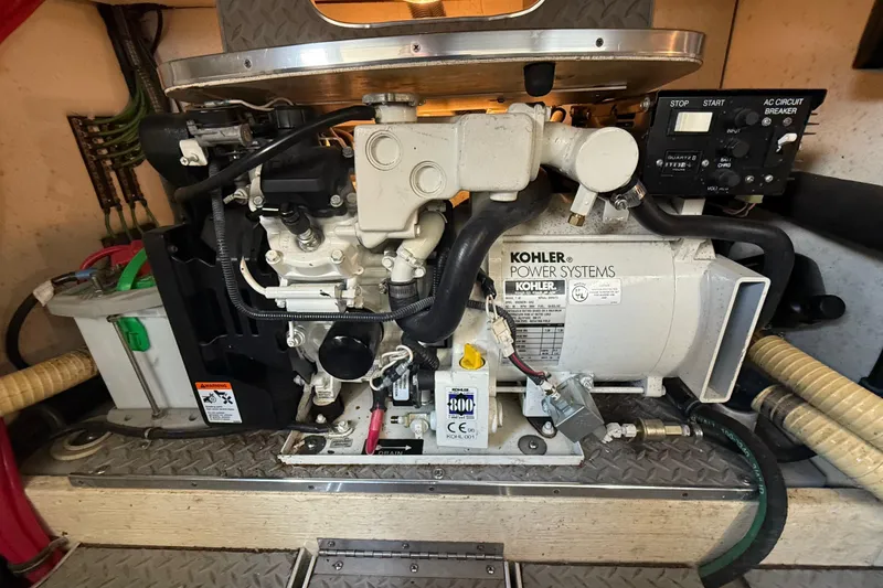 Slide: The Image of Engine compartment of a 2005 Formula 37 Performance Cruiser with Kohler power system. - 45