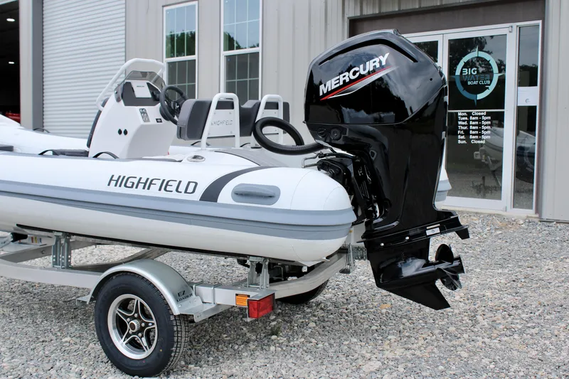 Slide: The Image of 2024 Highfield Sport 460 boat with Mercury outboard motor on a trailer. - 10
