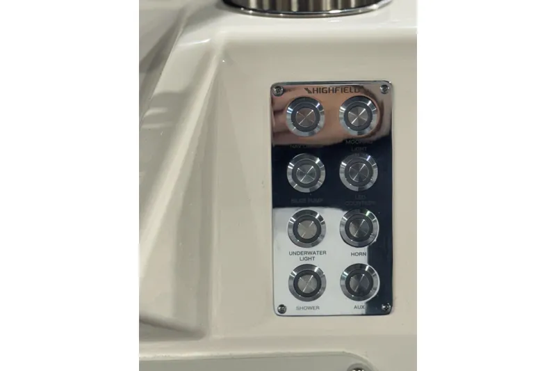 Slide: The Image of Control panel of 2026 Highfield Velox 560 boat with various function buttons. - 17