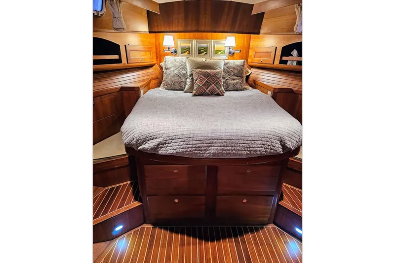 Slide: The Image of Luxurious cabin interior of 2005 Alden 49 Flybridge Express Cruiser with cozy bedding. - 35