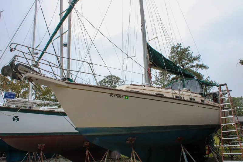 The Image of 1990 Island Packet 32 sailboat on stands, ready for maintenance. - 0