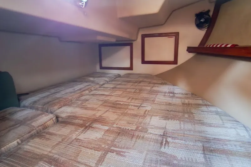 Slide: The Image of Interior cabin of 1990 Island Packet 32 sailboat with cozy sleeping area. - 46