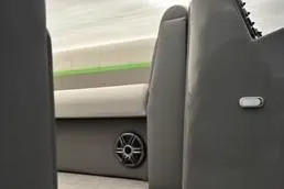 Slide: The Image of Interior of 2023 Qwest RLS 822 boat with modern seating and speaker. - 2