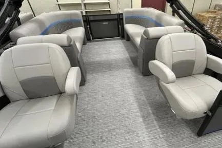Slide: The Image of 2023 Qwest RLS 822 boat interior with gray seating and modern design. - 3
